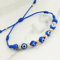 Pulsera tejida ojo turco y siete nudos con seis bolas diamantadas #4 y dos #3 ID: 1458
